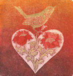 Image of a bird on top of a heart filled with flowers
