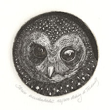 circular image of a spotted owl